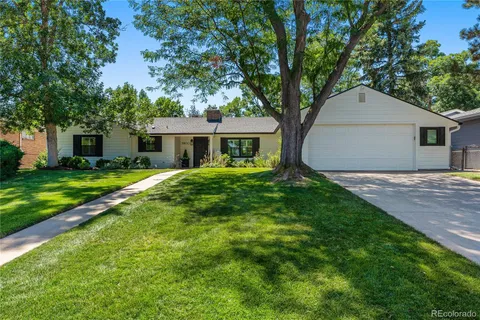 a front view of a house with yard