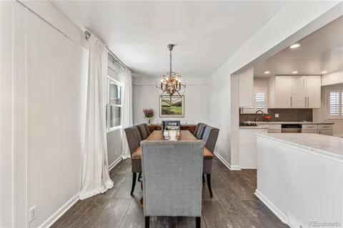a dining room with furniture window wooden floor