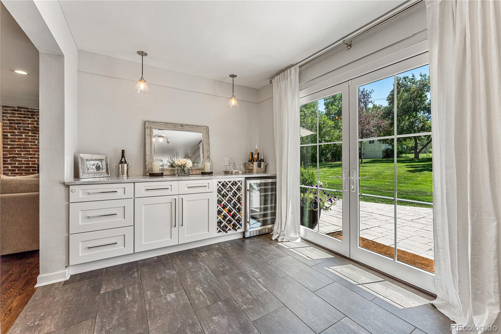 3800 East Dartmouth Avenue Denver, CO 80210 - Photo 16 of 50 a view of a bathroom with dual sinks