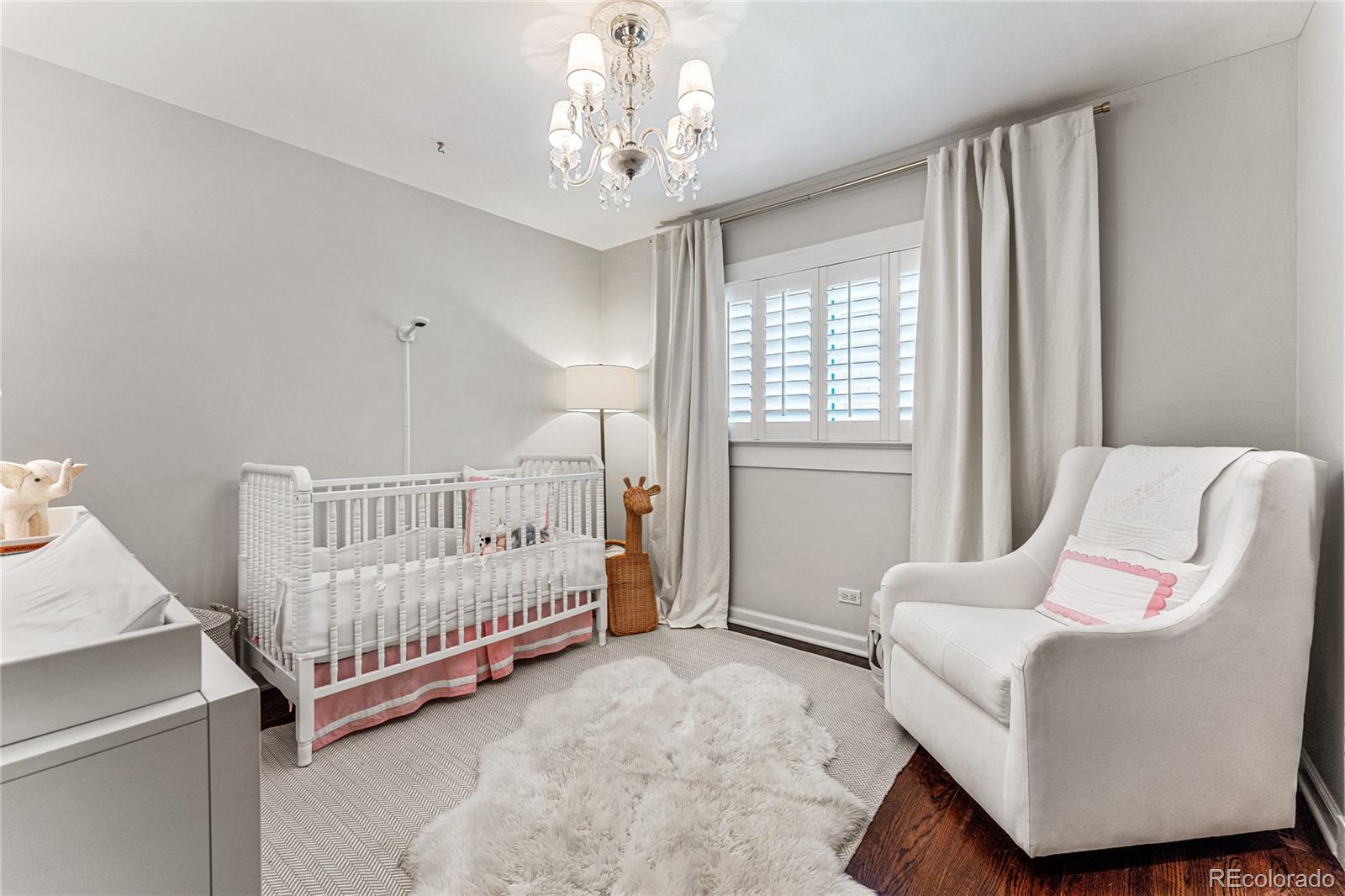 3800 East Dartmouth Avenue Denver, CO 80210 - Photo 25 of 50 a bedroom with furniture and a window