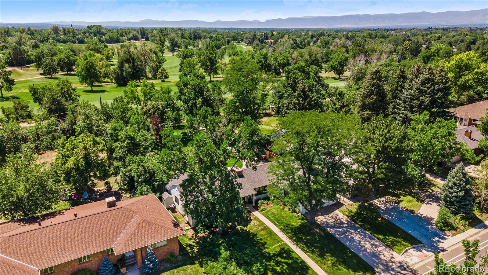 3800 East Dartmouth Avenue Denver, CO 80210 - Photo 39 of 50 an aerial view of a house with a yard