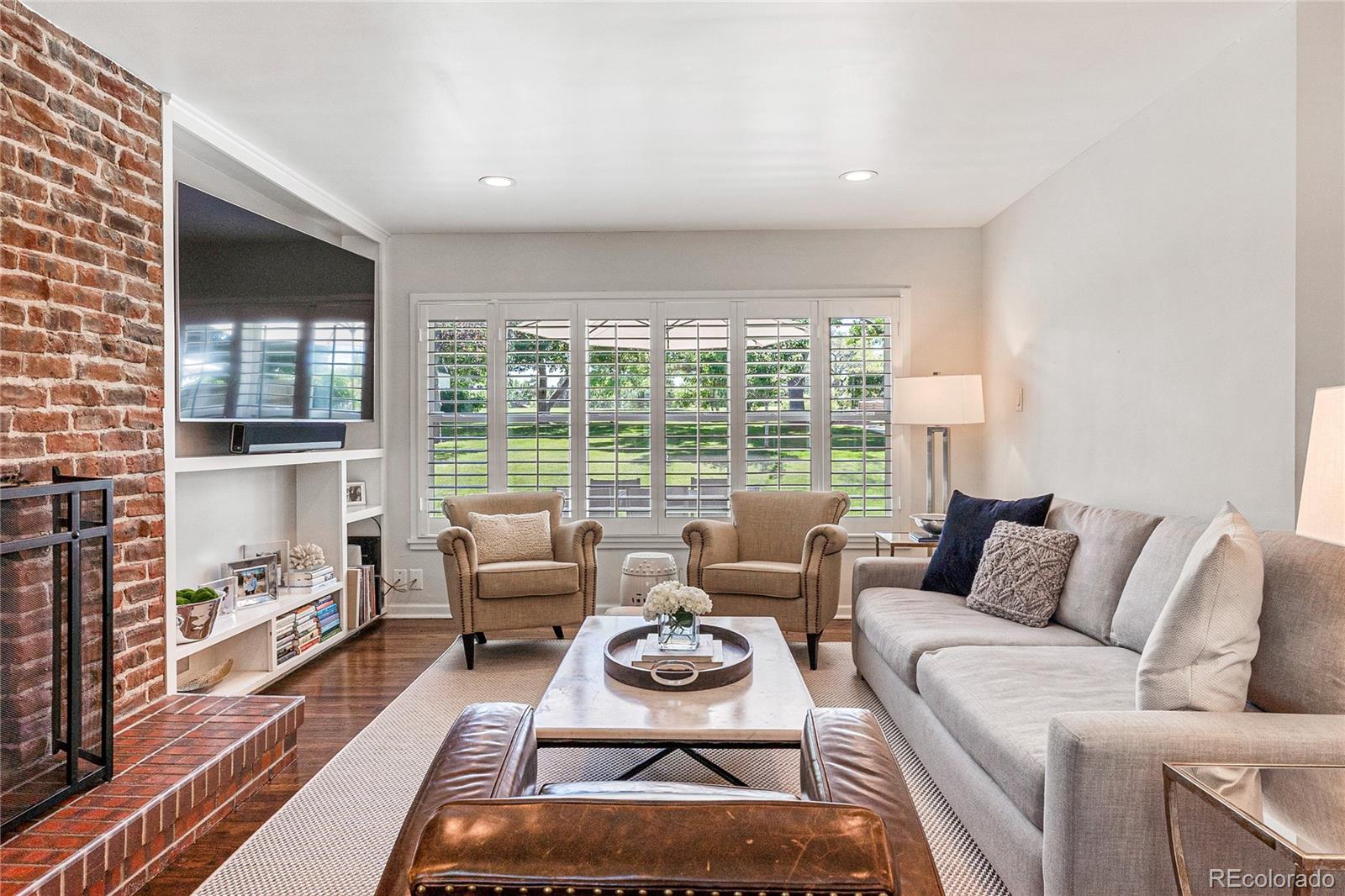 3800 East Dartmouth Avenue Denver, CO 80210 - Photo 4 of 50 a living room with furniture and a large window