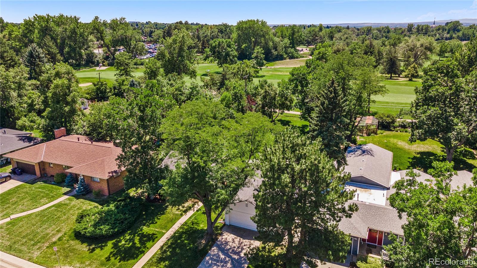 3800 East Dartmouth Avenue Denver, CO 80210 - Photo 41 of 50 an aerial view of a house with a yard