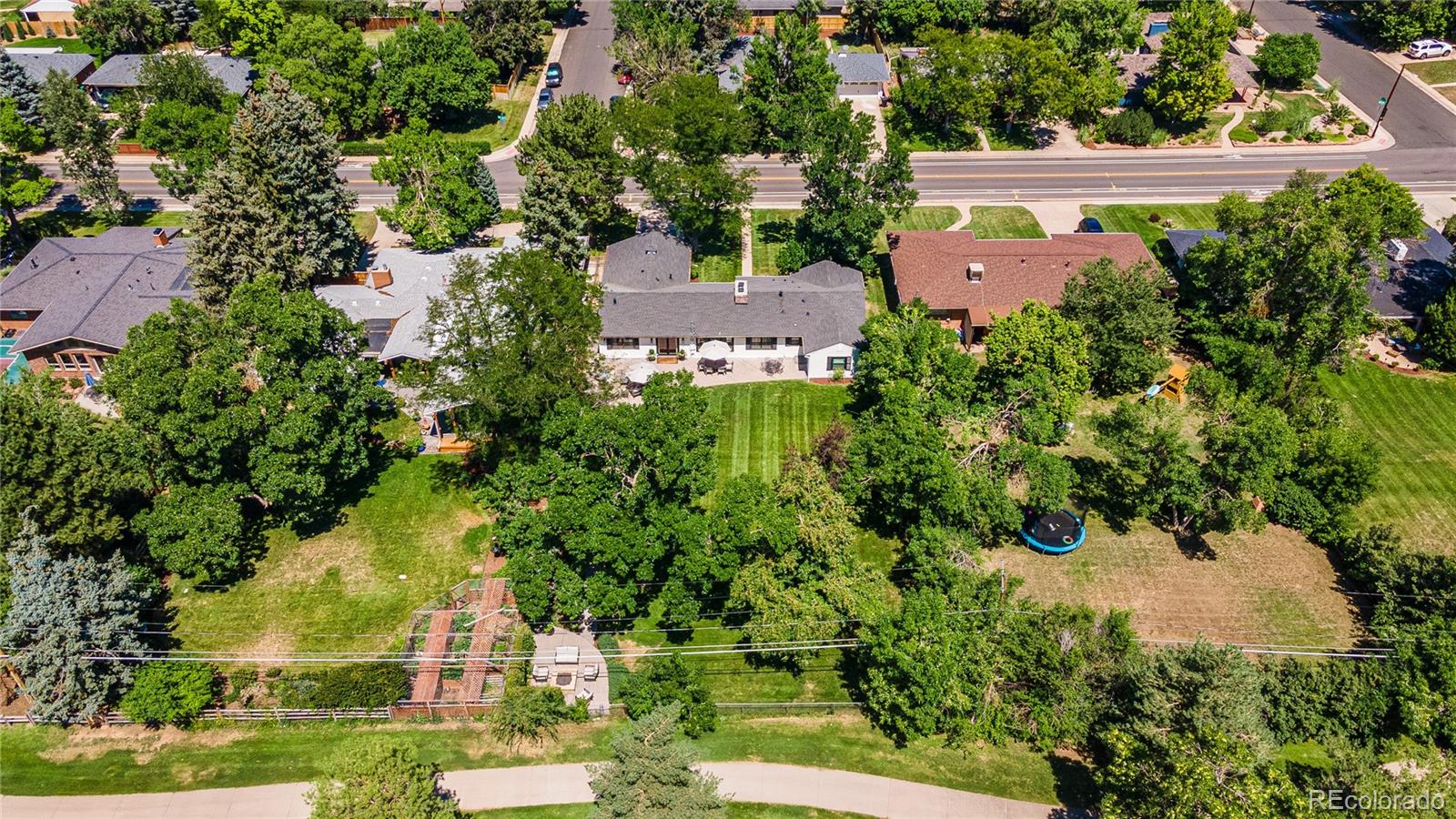 3800 East Dartmouth Avenue Denver, CO 80210 - Photo 44 of 50 an aerial view of a house with yard swimming pool and outdoor seating