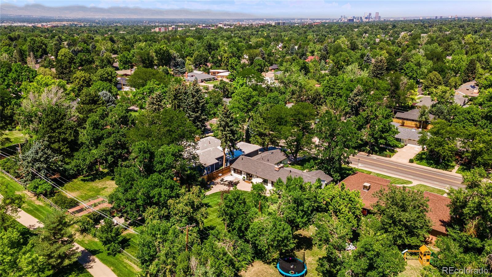 3800 East Dartmouth Avenue Denver, CO 80210 - Photo 46 of 50 an aerial view of a house with a yard