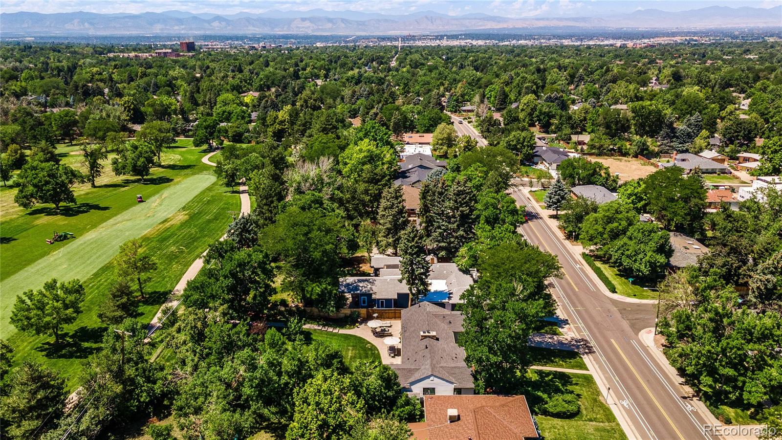3800 East Dartmouth Avenue Denver, CO 80210 - Photo 47 of 50 a view of a city with lush green forest