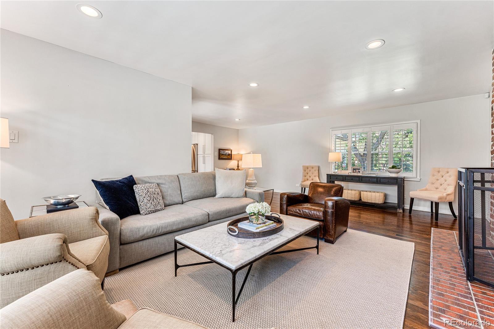 3800 East Dartmouth Avenue Denver, CO 80210 - Photo 7 of 50 a living room with furniture potted plant and window