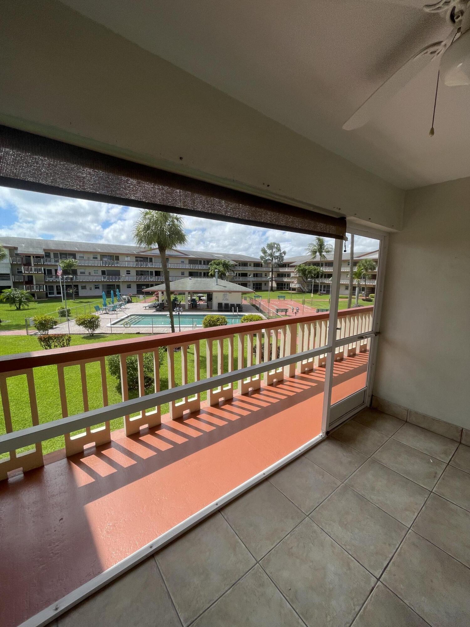 5300 Washington Street, Unit P234 Hollywood, FL 33021 - Photo 2 of 12 a view of a swimming pool with a seating space