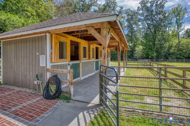 an aerial view of a house with mountain view