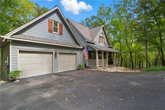 a front view of a house with a garage