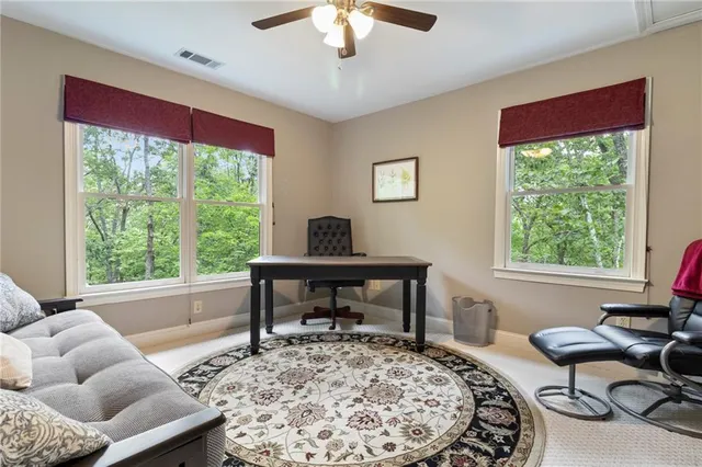 a view of a dining room with furniture