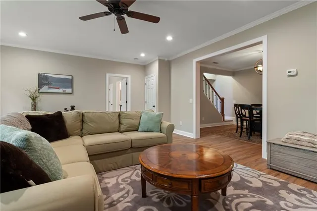 a spacious bedroom with a bed and a couch