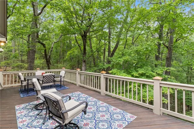 a view of roof deck with furniture