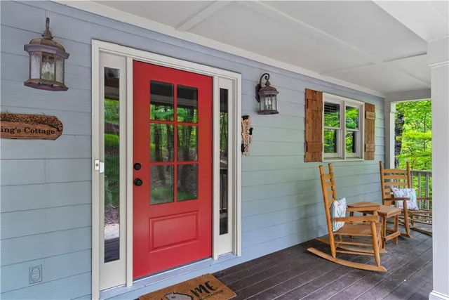 a view of living room with furniture and a window