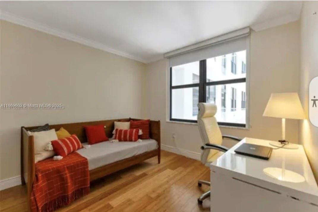 9801 Collins Avenue, Unit 10T Bal Harbour, FL 33154 - Photo 12 of 20 a living room with furniture and a window