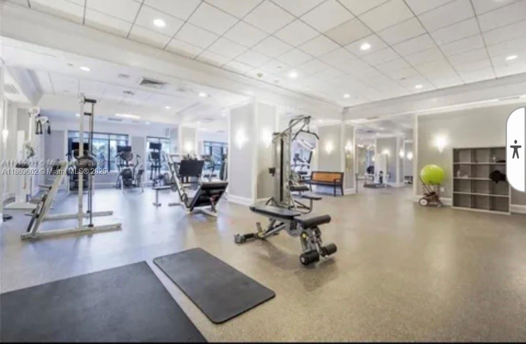 9801 Collins Avenue, Unit 10T Bal Harbour, FL 33154 - Photo 18 of 20 a view of a room with gym equipment