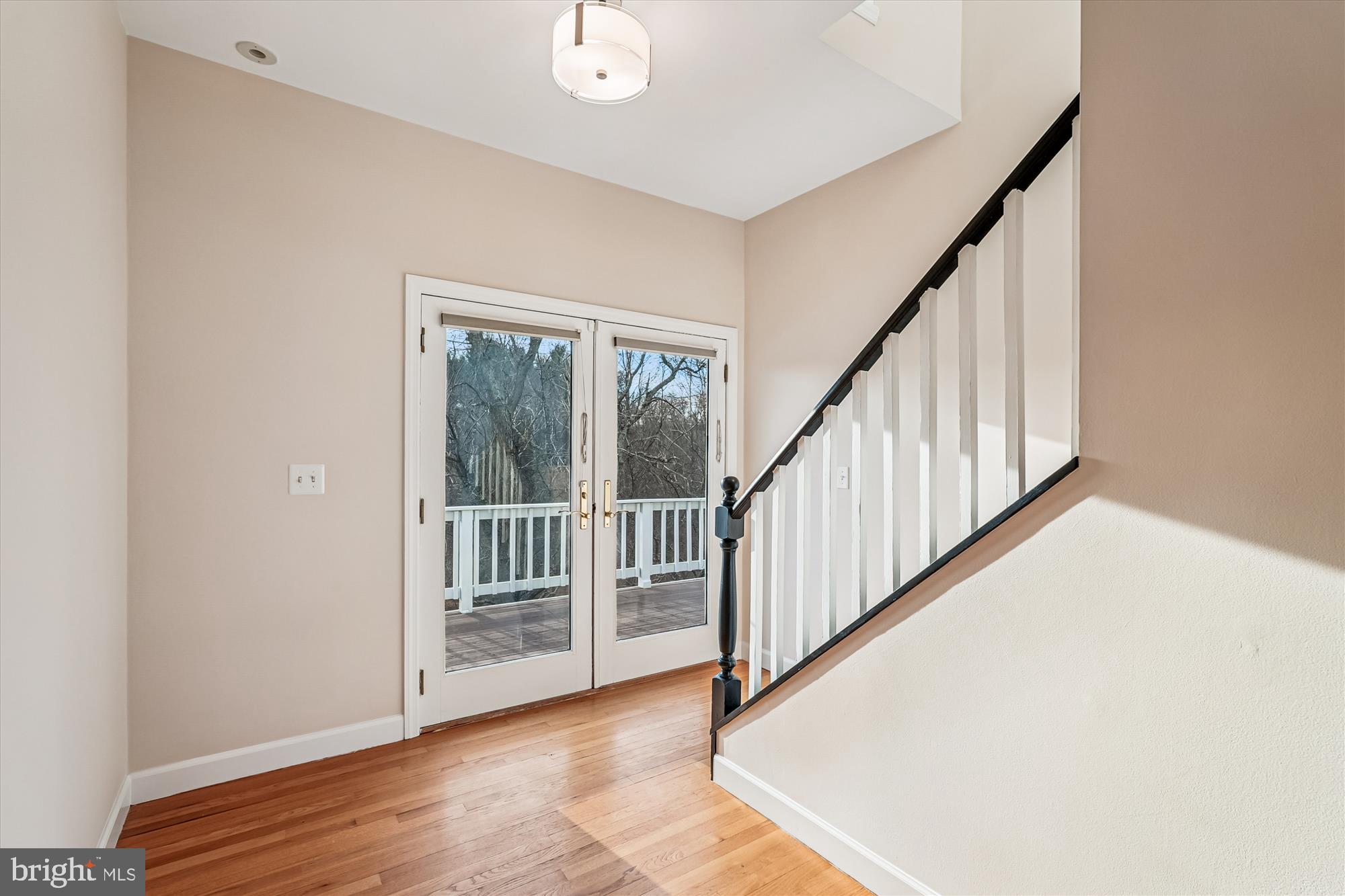 20919 Watermill Road Purcellville, VA 20132 - Photo 40 of 88 Hallway w/HW Floors, French Doors to Deck