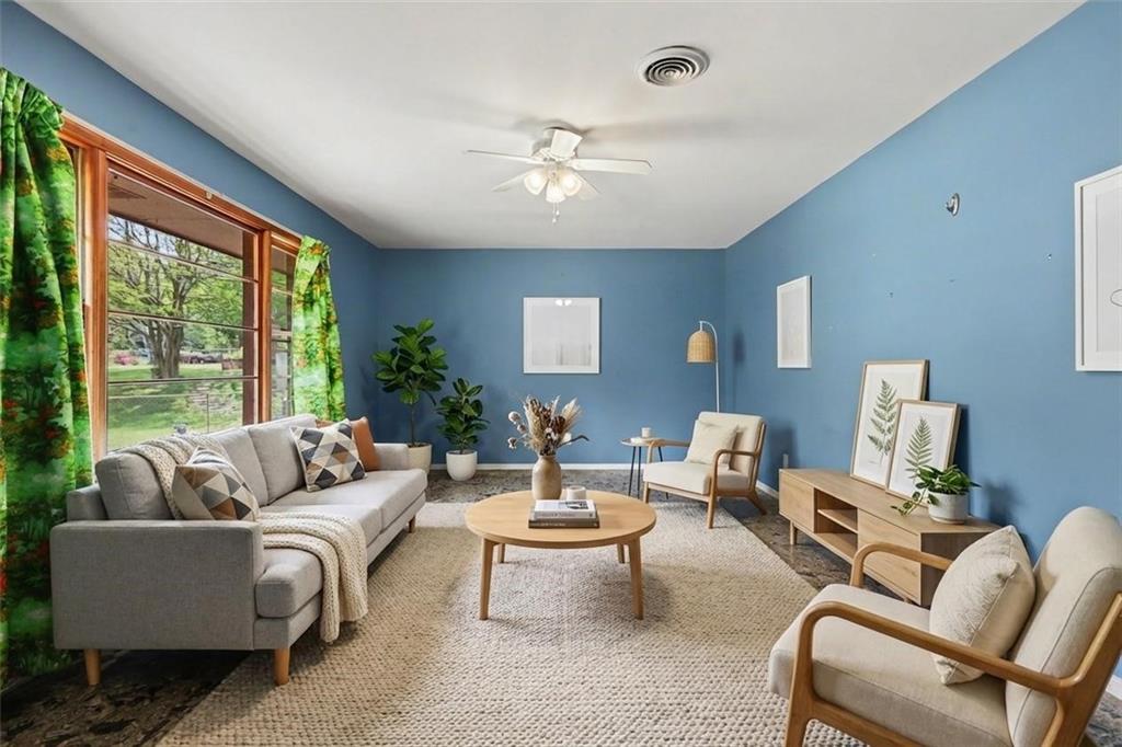 7019 Lake View Lane Doraville, GA 30360 - Photo 6 of 32 a living room with furniture and a large window