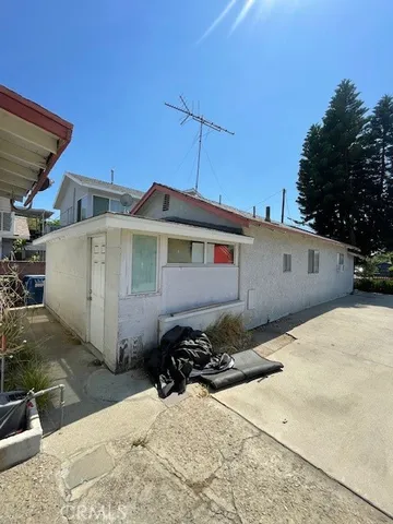 a view of a car parked in front of house