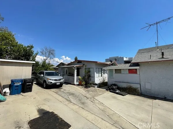 a car parked in front of a house