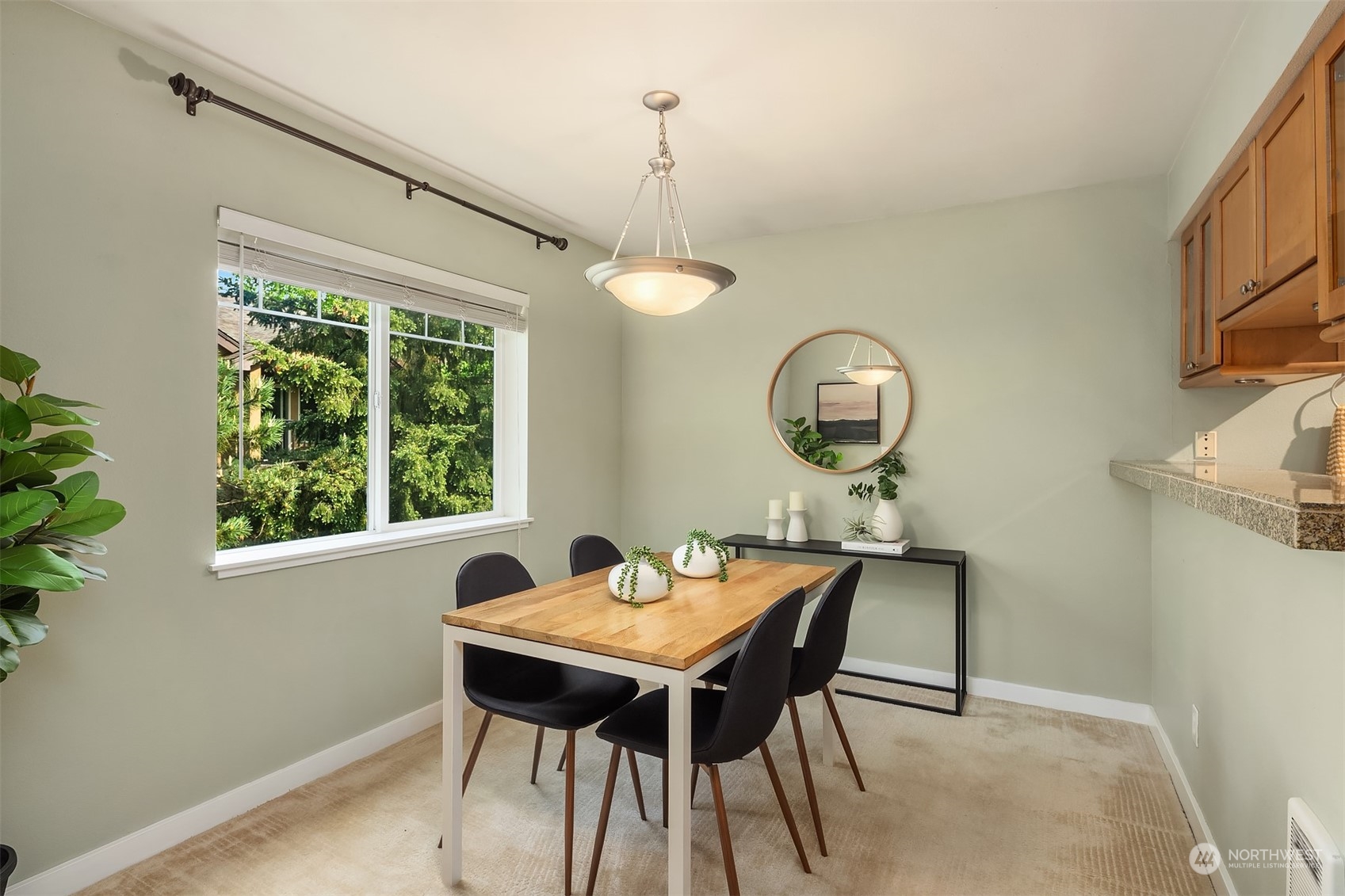 18930 Bothell Everett Highway, Unit D302 Bothell, WA 98012 - Photo 7 of 25 a view of a dining room with furniture window and outside view