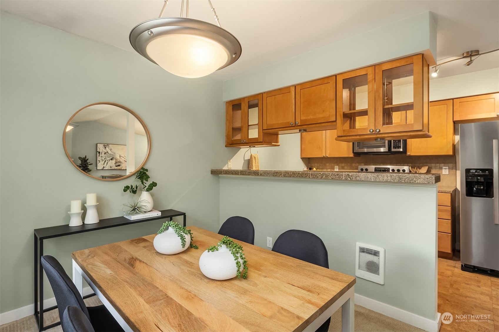 18930 Bothell Everett Highway, Unit D302 Bothell, WA 98012 - Photo 8 of 25 a view of a dining room with furniture
