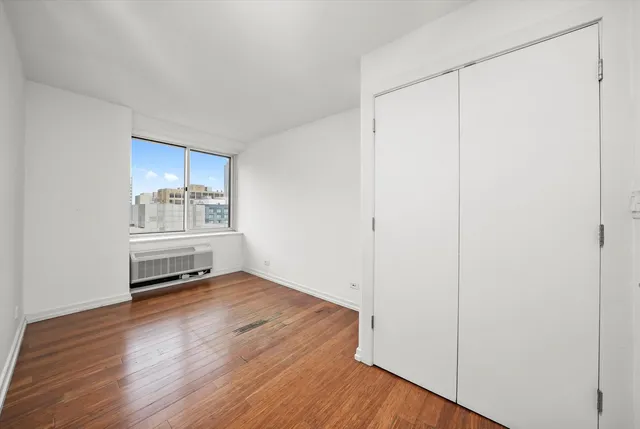 a view of an empty room and window