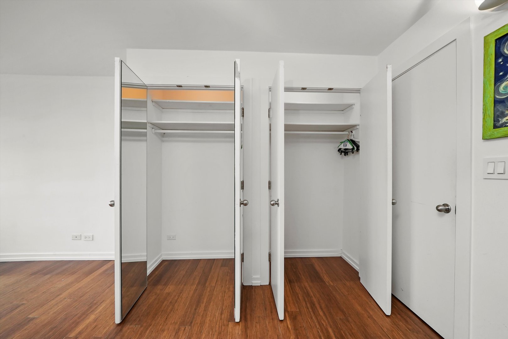 211 East Ohio Street, Unit 2707 Chicago, IL 60611 - Photo 30 of 45 a view of walk in closet with wooden floor