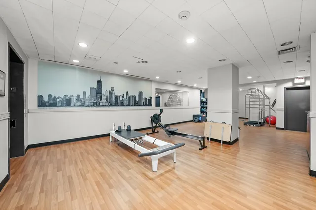 a room with lots of gym equipment
