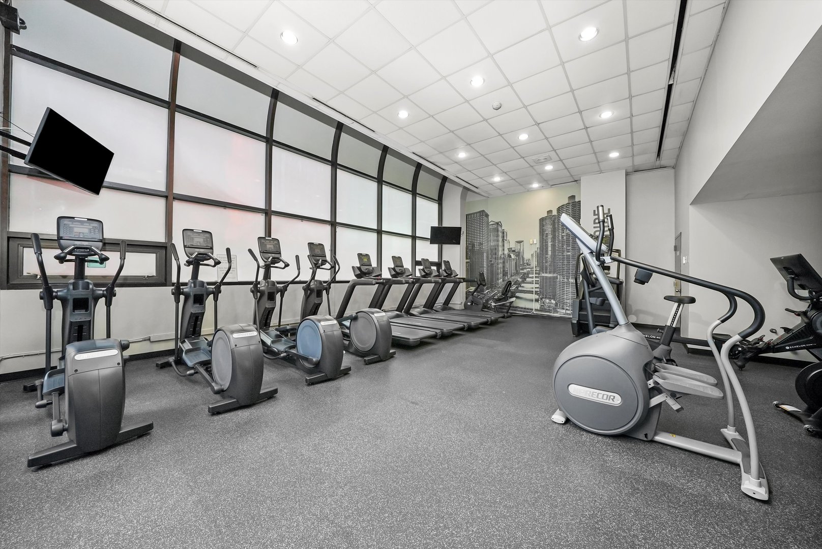 211 East Ohio Street, Unit 2707 Chicago, IL 60611 - Photo 36 of 45 a view of a room with gym equipment