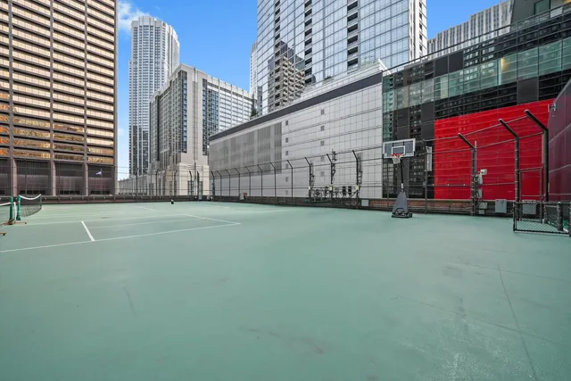 an aerial view of a building with glass windows