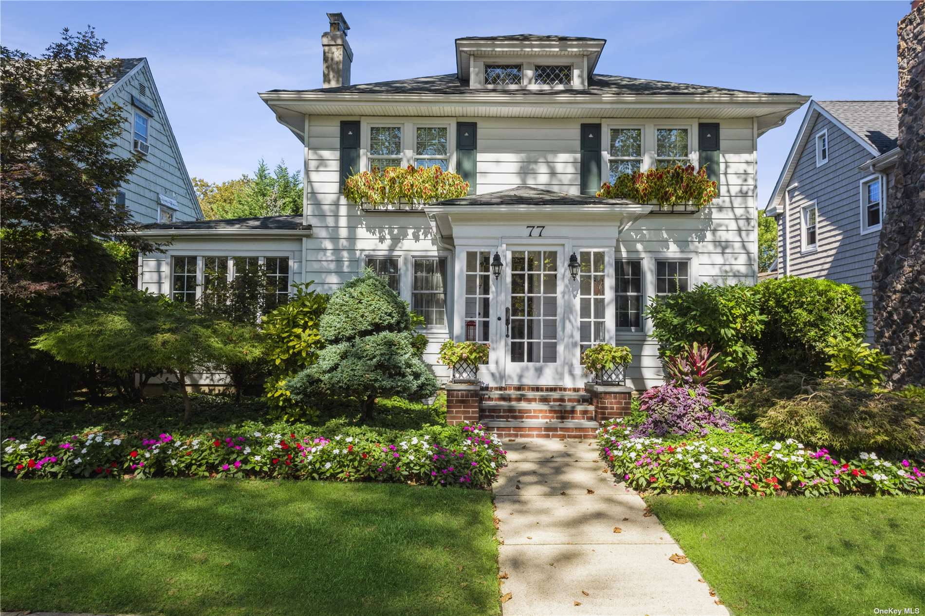 a house view with a garden space