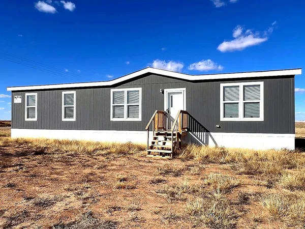a house view with a outdoor space
