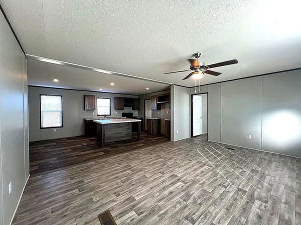 a view of an empty room and window