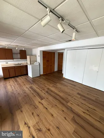 a view of a room with racks on the wall