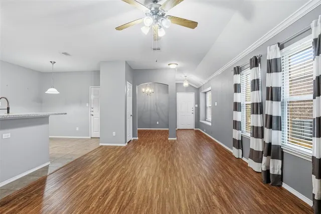 a view of a kitchen with a sink and cabinet