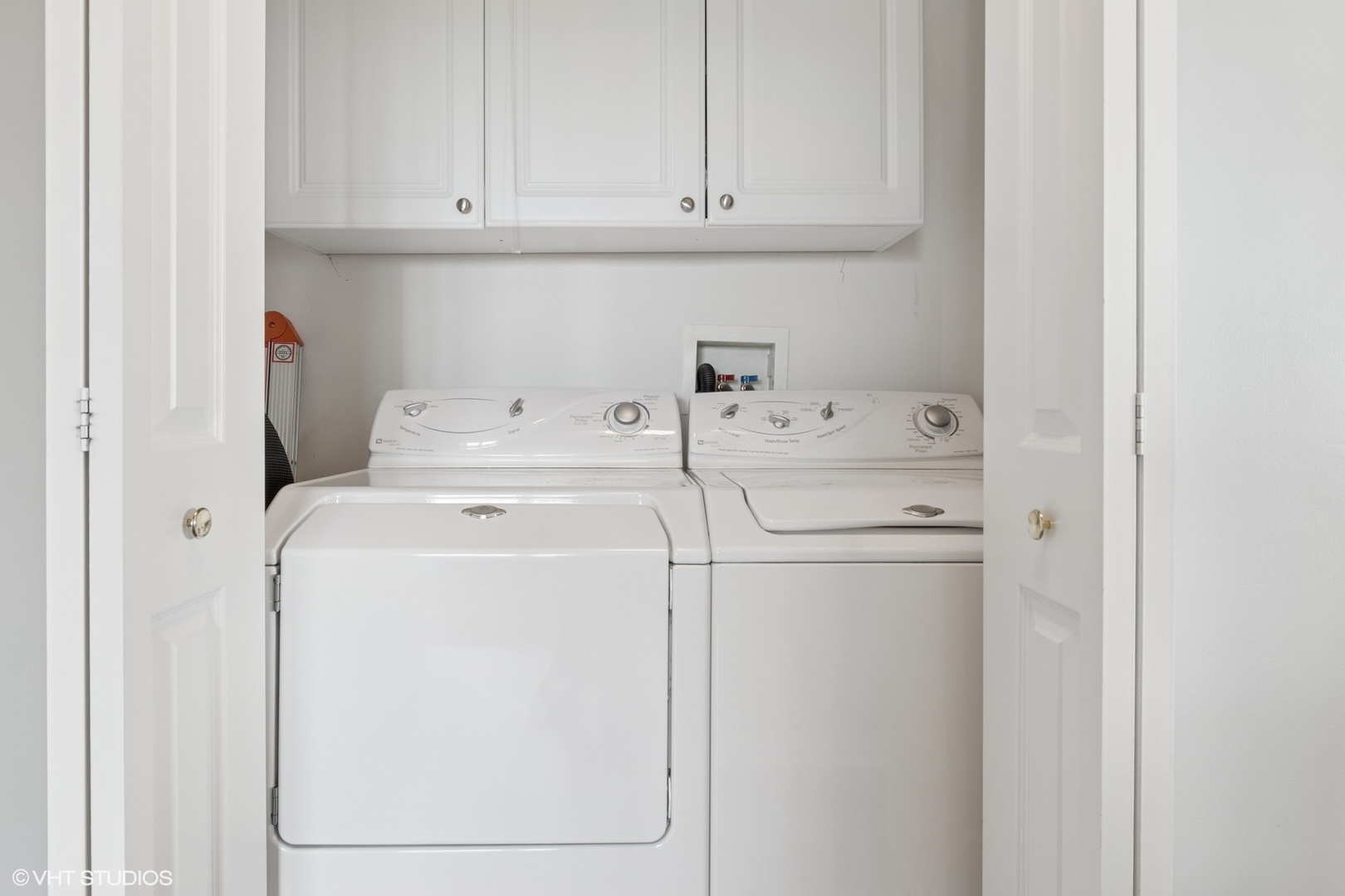 -s099 Lee Court, Unit 401 Winfield, IL 60190 - Photo 14 of 19 a utility room with dryer and washer