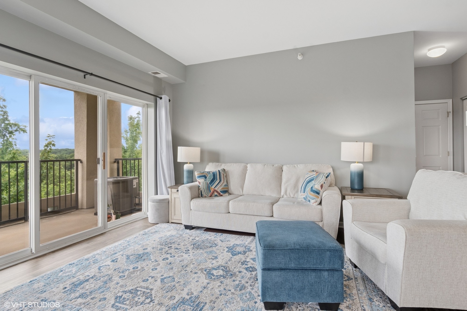 -s099 Lee Court, Unit 401 Winfield, IL 60190 - Photo 6 of 19 a living room with furniture and a large window