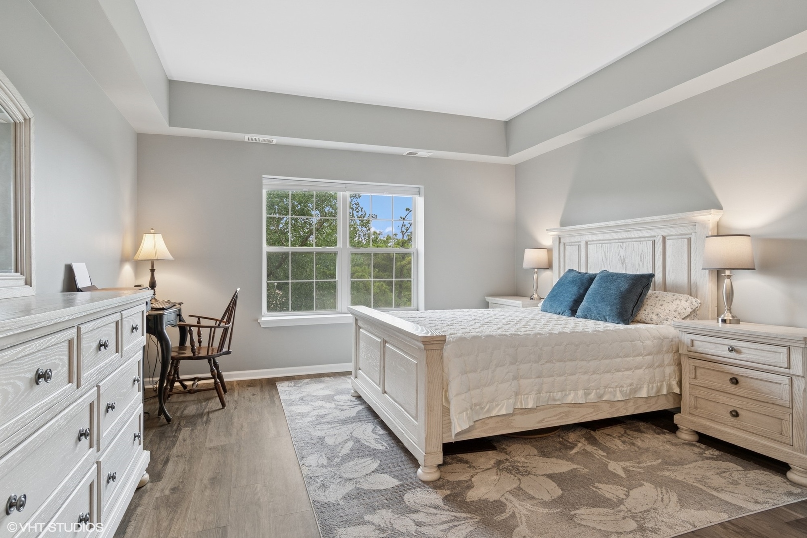 -s099 Lee Court, Unit 401 Winfield, IL 60190 - Photo 9 of 19 a room with a bed and a table in it