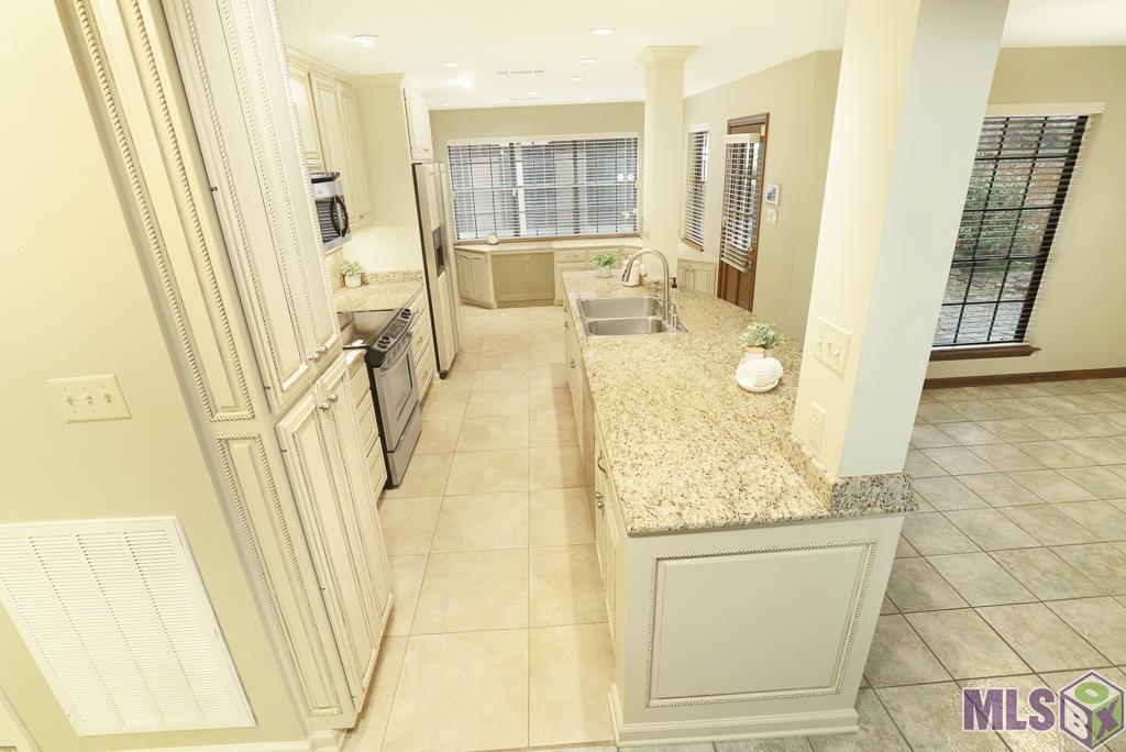 1576 Normandy Drive Baton Rouge, LA 70806 - Photo 15 of 32 Kitchen View from Stairs