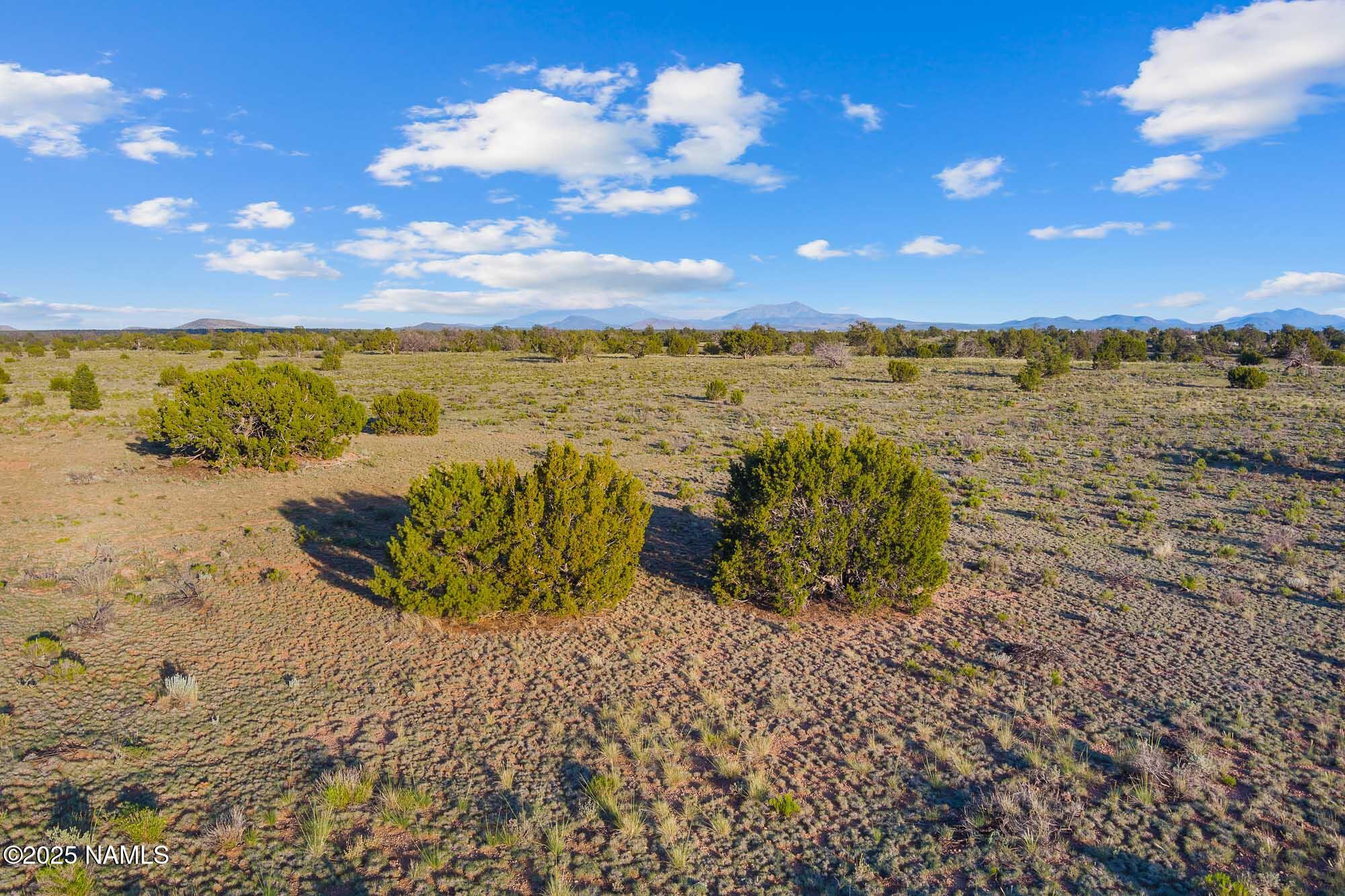 4532 East Indian Meadows Road Williams, AZ 86046 - Photo 20 of 37 a view of a lake with a beach