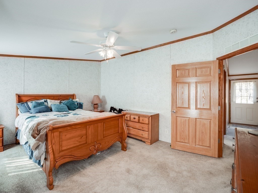 17 Medallion Road Holbrook, MA 02343 - Photo 20 of 39 a bedroom with bed and window