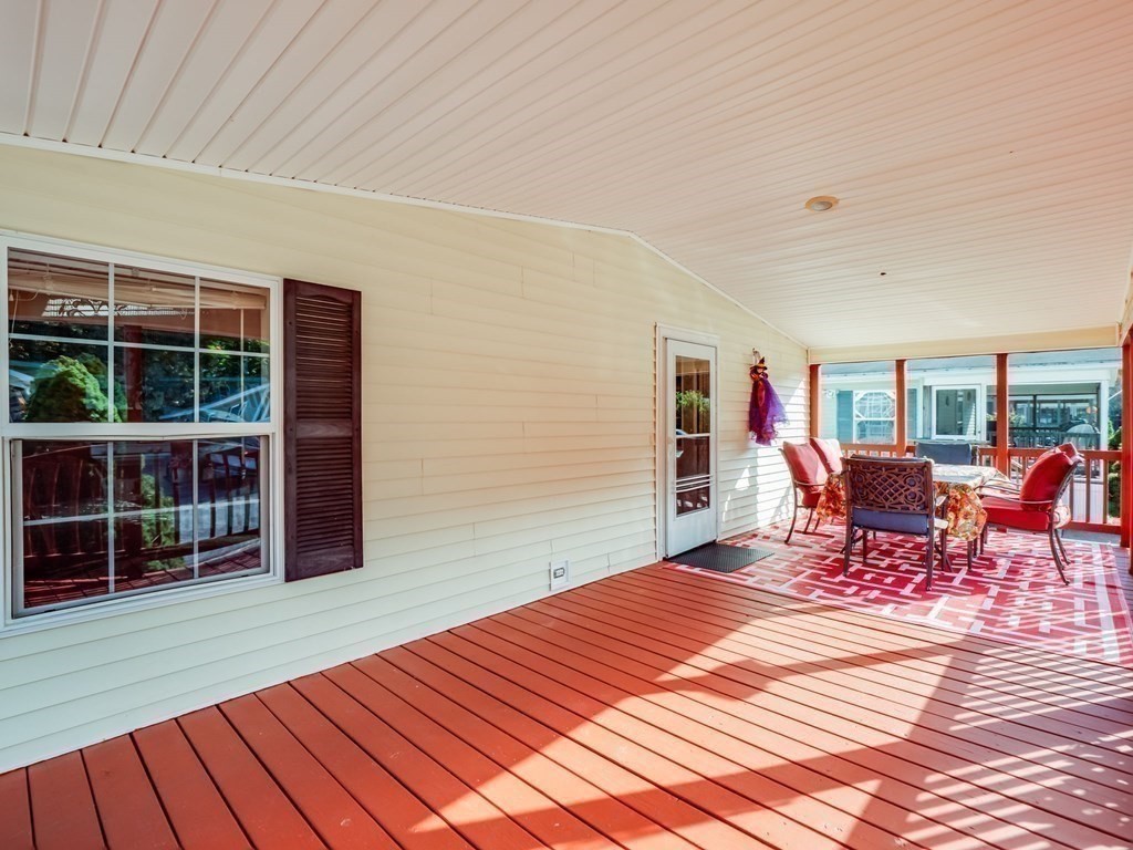 17 Medallion Road Holbrook, MA 02343 - Photo 5 of 39 a outdoor space with a large window and furniture