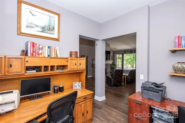 a room with furniture and wooden floor