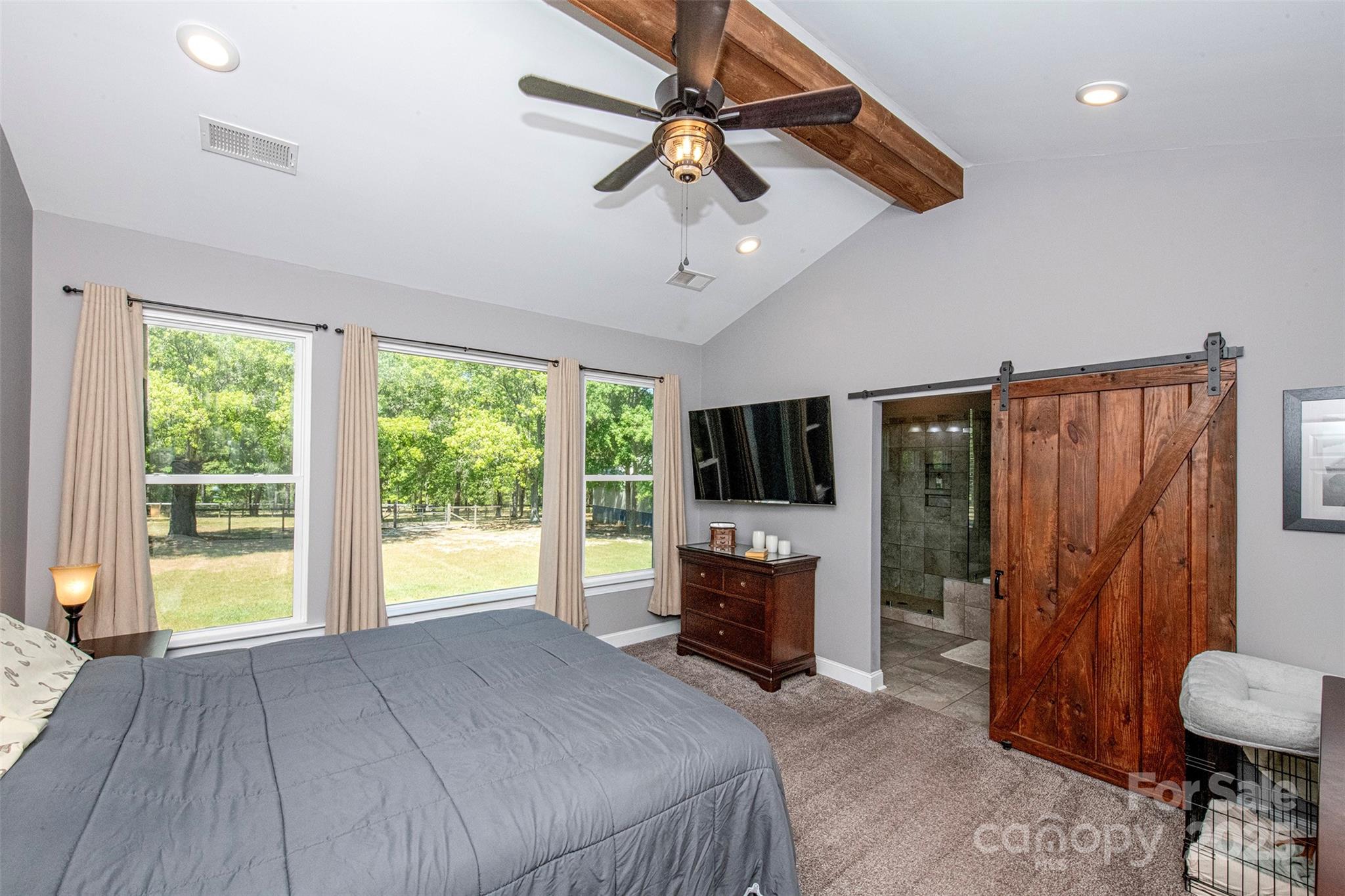 340 Hound Holw Road Camden, SC 29020 - Photo 18 of 28 a view of a livingroom with furniture and a flat screen tv