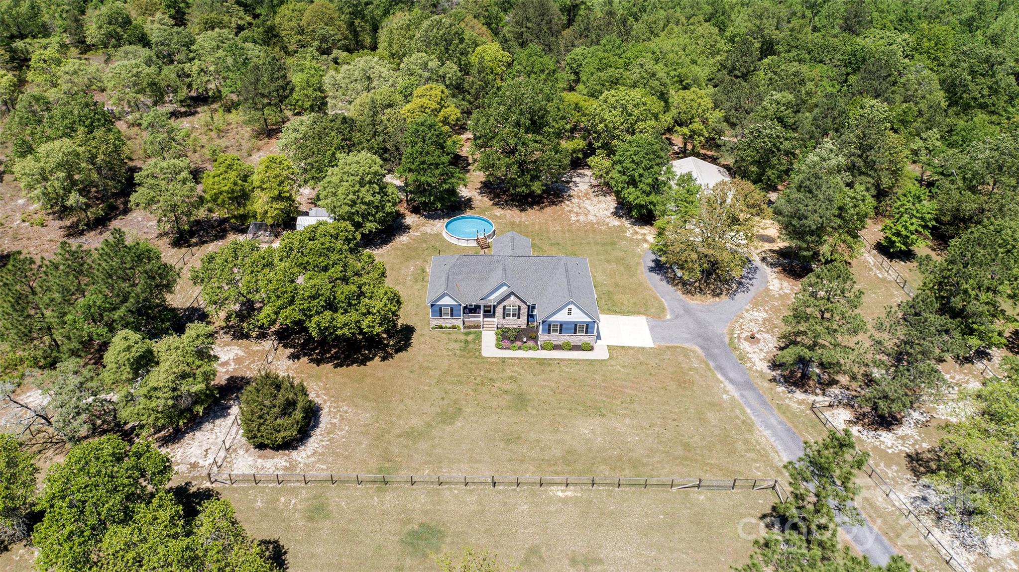 340 Hound Holw Road Camden, SC 29020 - Photo 2 of 28 an aerial view of a house with yard