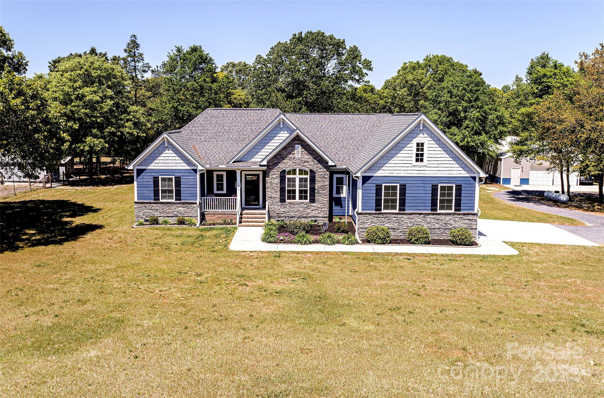 340 Hound Holw Road Camden, SC 29020 - Photo 3 of 28 a front view of a house with garden