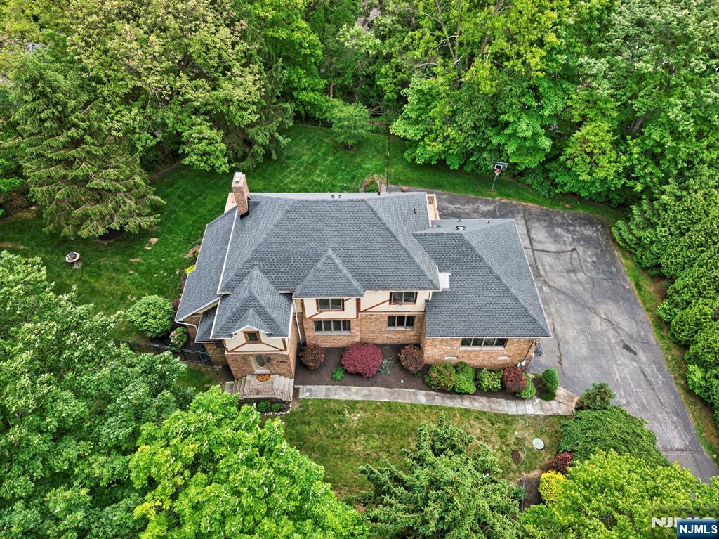 5110 Berkshire Valley Road Oak Ridge, NJ 07438 - Photo 3 of 49 an aerial view of a house with a big yard
