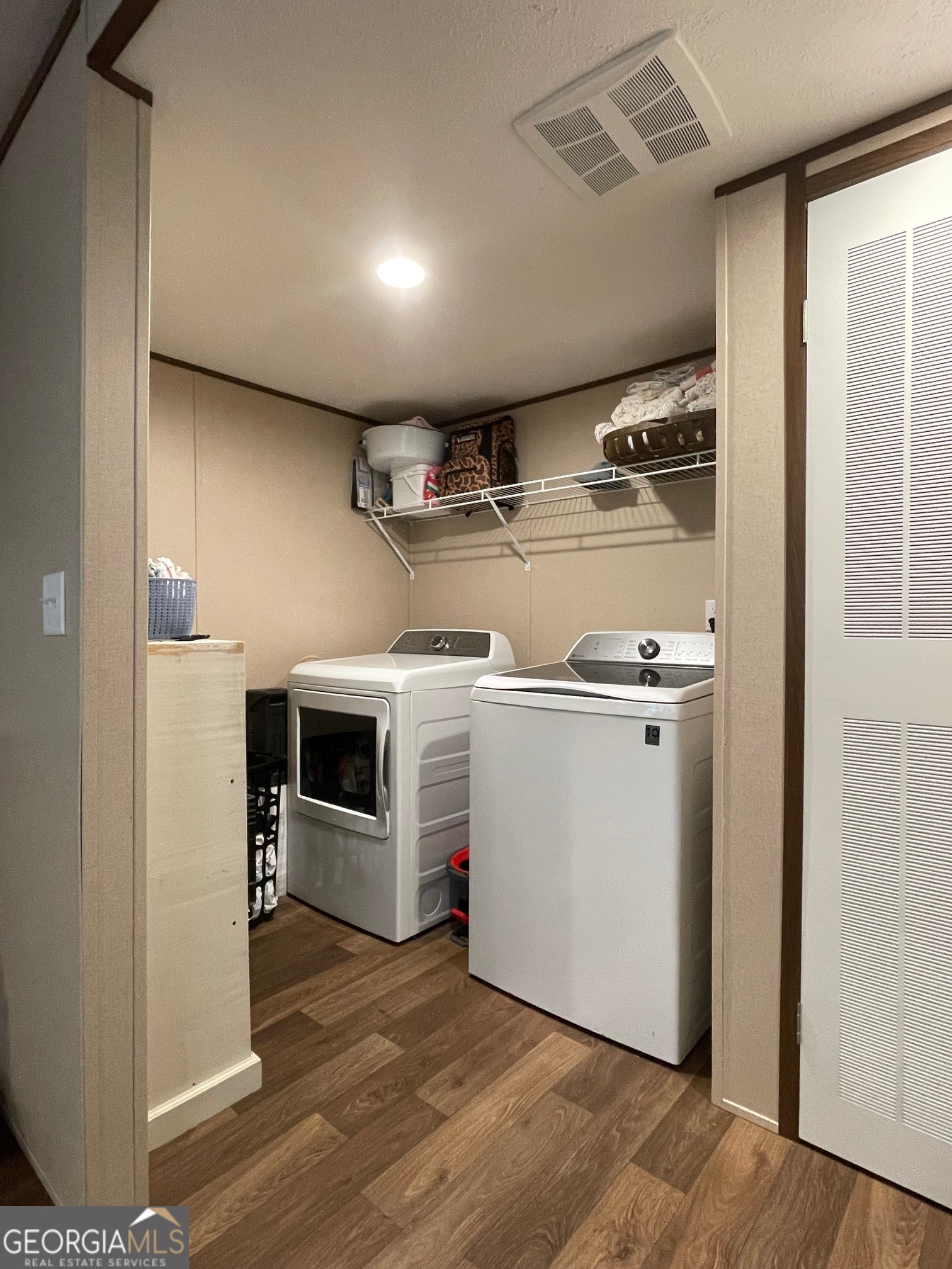 5571 Old Dixie Highway South Springfield, GA 31329 - Photo 6 of 38 a view of a storage & utility room with washer and dryer