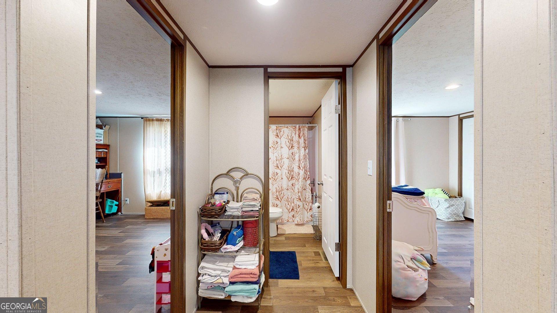 5571 Old Dixie Highway South Springfield, GA 31329 - Photo 8 of 38 a view of a hallway with closet and toys